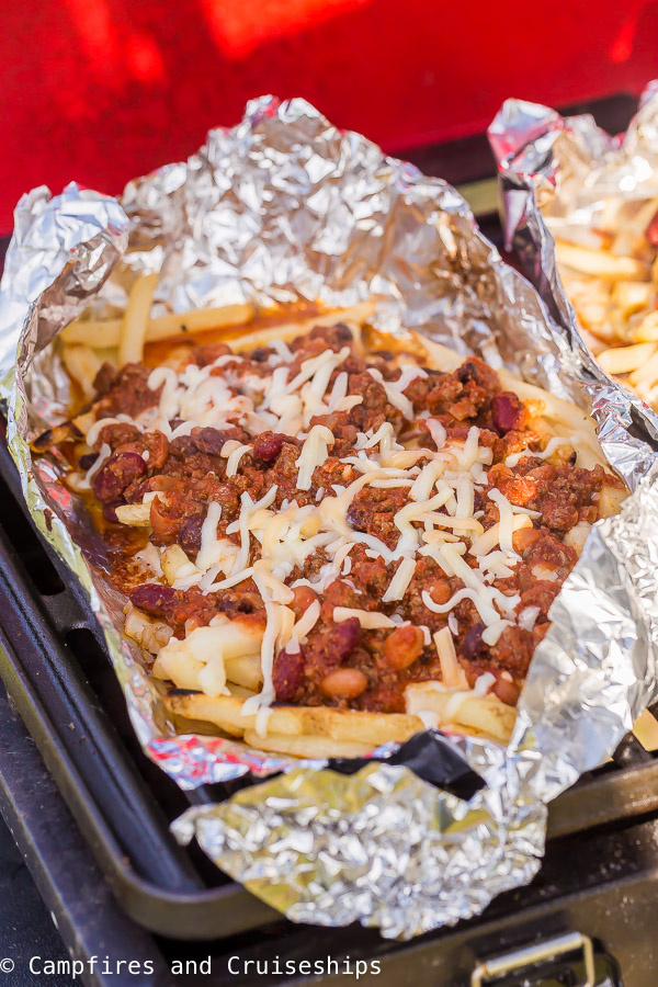 chili cheese fries in foil packet on the grill