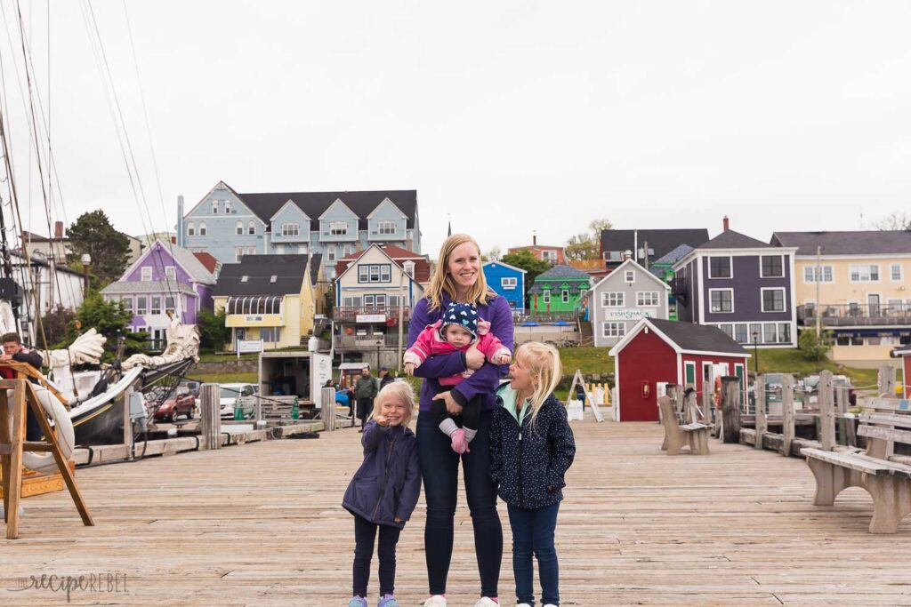 mom and three daughters on the dock in lunenberg