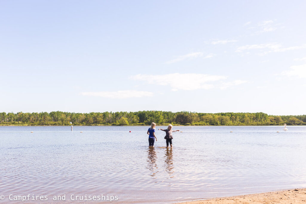 two girls walking in water at stephenfield provincial park