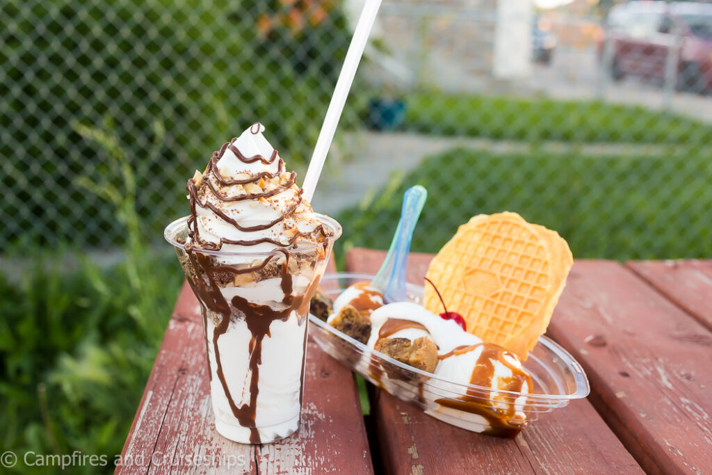 dug and betty's parfait and sundae on picnic table