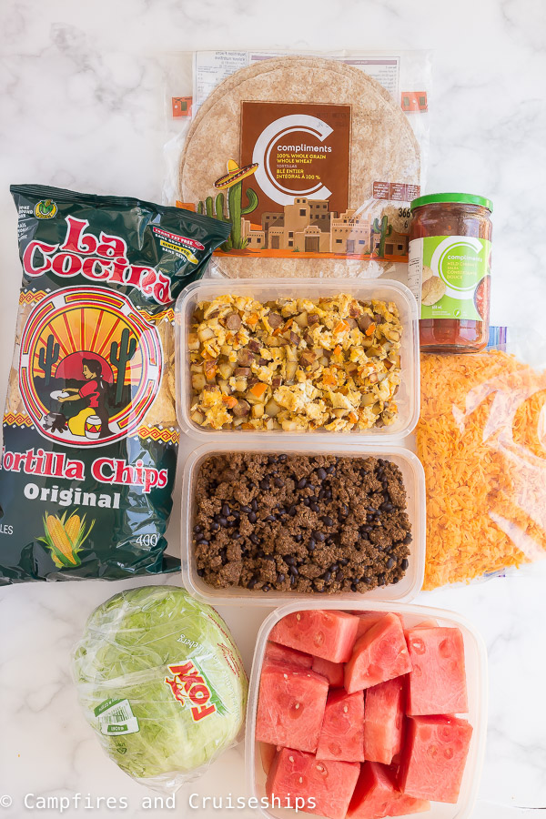 camping meal prep lunches laid out on white background