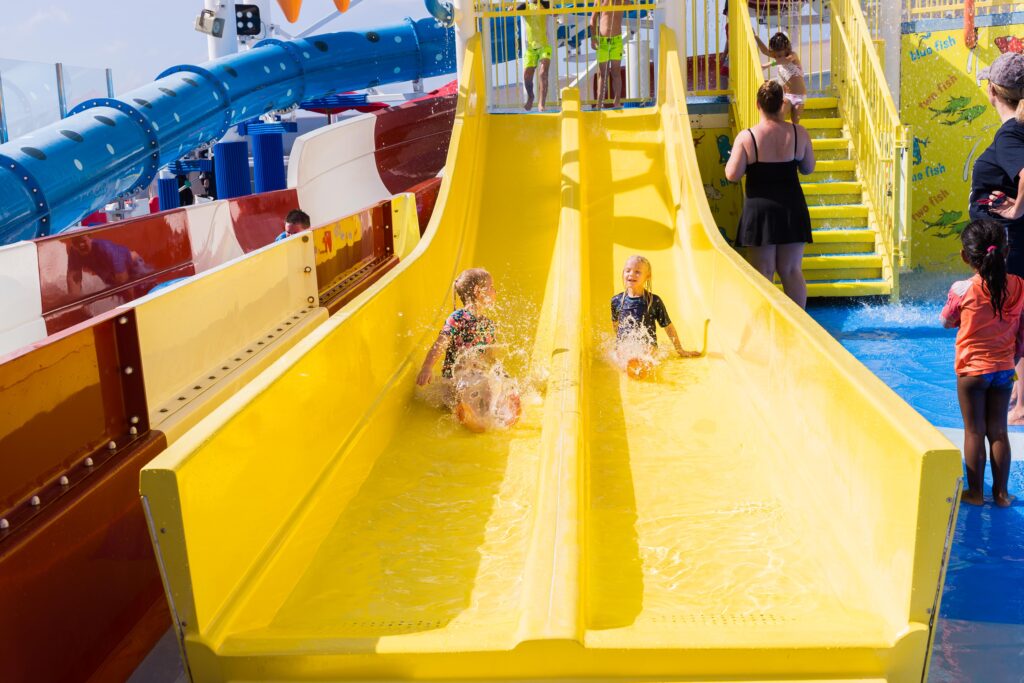 two girls on slides in carnival waterworks