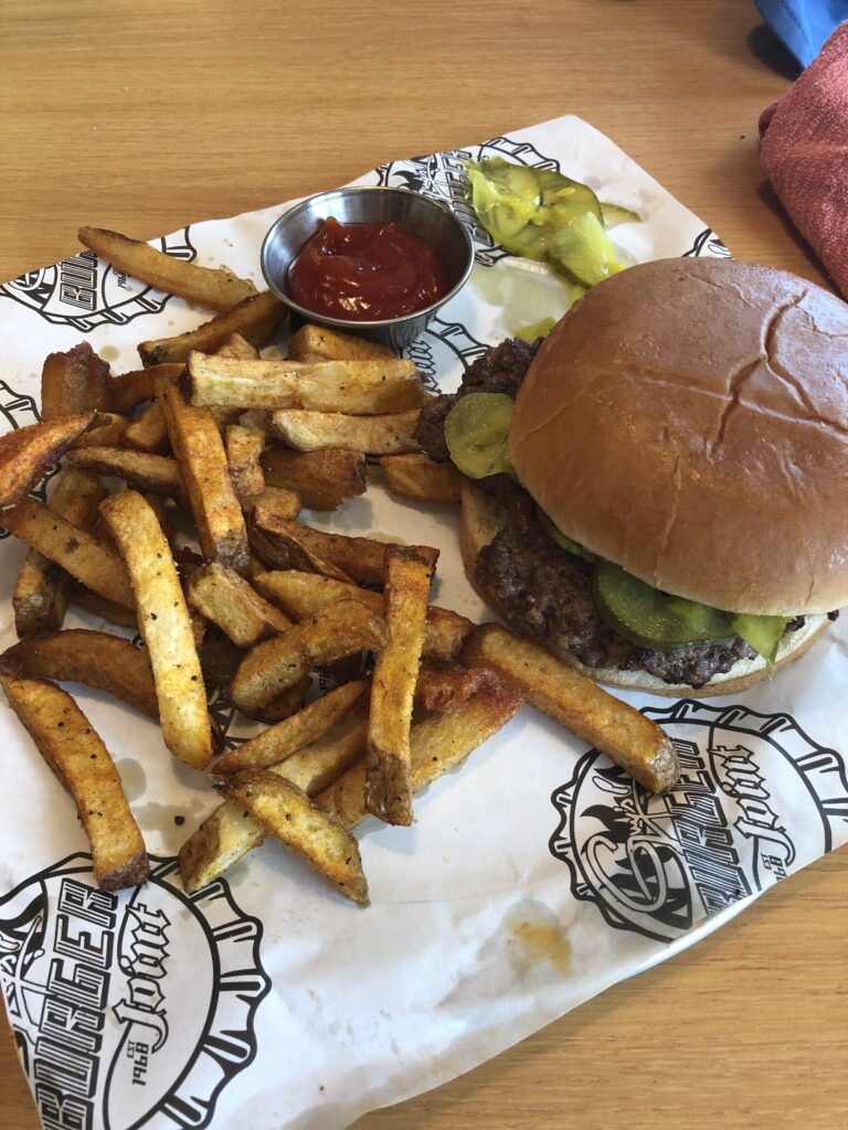 burger and fries from guy's burger joint on carnival horizon